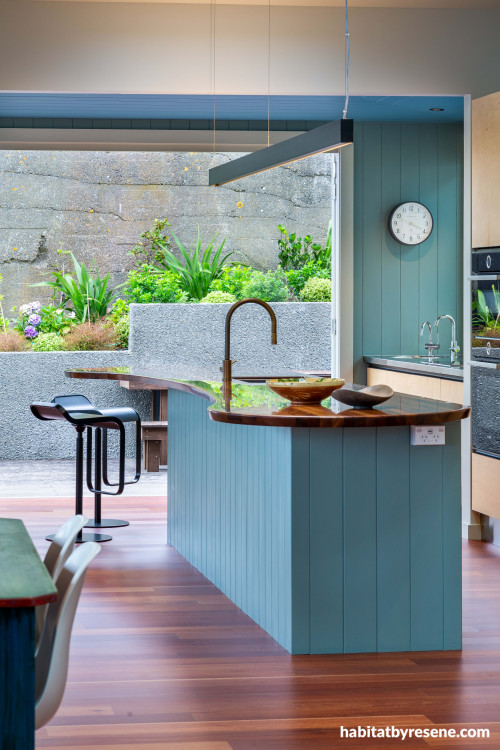 Open plan kitchen in fresh blue colour