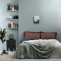 Soft colour tones in bedroom create a relaxing feel