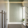 Home villa bathroom with white and green walls