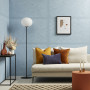 White sofa and blue walls in lounge