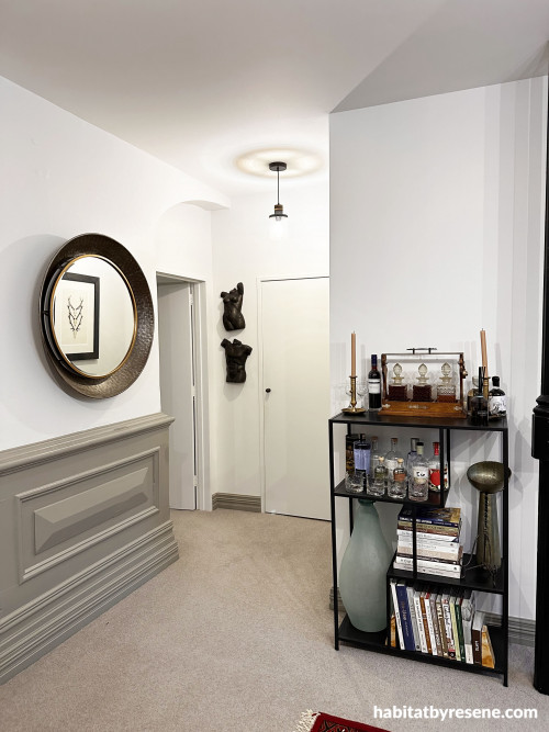 Throughout Neil’s home, the walls were brightened by painting them with Resene Black White. A complementary shade of Resene Friar Greystone was used on the lower wood panelling. The ceiling is painted in Resene Eighth Black White and trims in Resene Snow 