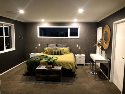 An empty Feilding paddock becomes a family home with an inspired moody dark grey colour palette including Resene Blue Charcoal and Resene Crowshead