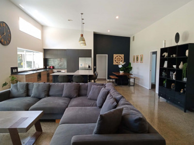 An empty Feilding paddock becomes a family home with an inspired moody dark grey colour palette including Resene Blue Charcoal and Resene Crowshead