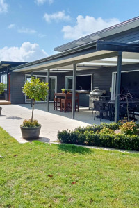 An empty Feilding paddock becomes a family home with an inspired moody dark grey colour palette including Resene Blue Charcoal and Resene Crowshead