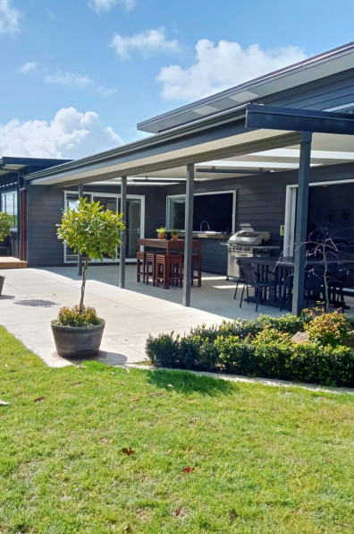 An empty Feilding paddock becomes a family home with an inspired moody dark grey colour palette including Resene Blue Charcoal and Resene Crowshead