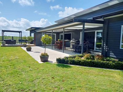 An empty Feilding paddock becomes a family home with an inspired moody dark grey colour palette including Resene Blue Charcoal and Resene Crowshead