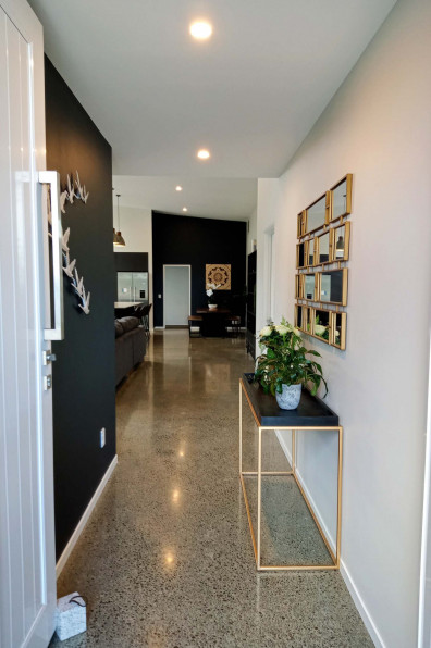 An empty Feilding paddock becomes a family home with an inspired moody dark grey colour palette including Resene Blue Charcoal and Resene Crowshead