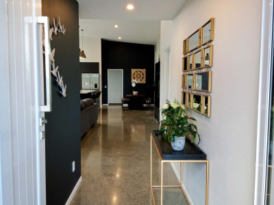 An empty Feilding paddock becomes a family home with an inspired moody dark grey colour palette including Resene Blue Charcoal and Resene Crowshead