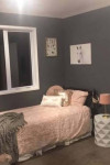 An empty Feilding paddock becomes a family home with an inspired moody dark grey colour palette including Resene Blue Charcoal and Resene Crowshead