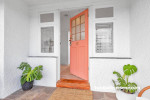 pink door, front of home, pink