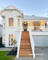 An exterior to make you stop and marvel in its beauty. This home is a stunning sight, painted in Resene Eighth Black White, with a dramatic and bold front door in Resene Black. 