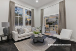 This charming living room is adorned in classic neutral décor creating a cosy, inviting feel. The walls are painted in Resene Wan White, with trims and ceiling in Resene Eighth Black White. 