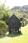 Hen hut with Resene Pitch Black and Resene Pioneer Red