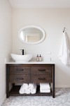 A coastal home with a creative neutral palette is renovated on time and under budget