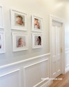 The hallway is painted in Resene Merino, with lower panelling and doors in Resene Alabaster, now showcasing pictures of her own children, just as it once did of her as a child. 