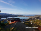 The view from the open-plan upper level with its sweeping panoramas of Lyall Bay and the Remutaka Range.