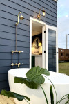 A Hamptons themed tiny home designed by lady tradies creates affordable luxury