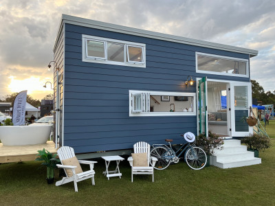 A Hamptons themed tiny home designed by lady tradies creates affordable luxury