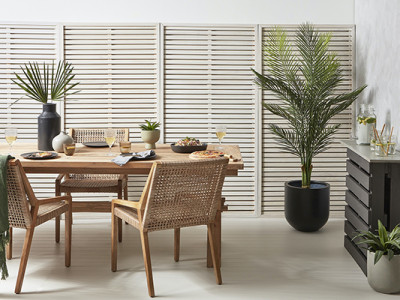 Entertain outdoors in style this holiday season with these tips for decorating courtyards, gardens and patios