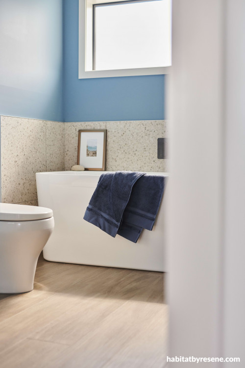 A blue-grey slate with hints of summer sky, Resene Lazy River, was used in this bathroom. 