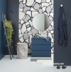 The back wall of this powder room is in Resene Jaguar with painted ‘faux’ terrazzo in Resene Alpaca, Resene Urbane and Resene Tom Tom. 