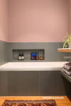 Warm tone painted in bathroom create inviting space