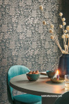 Dark floral wallpaper fits just right into small dining space