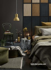 Moody bedroom painted in dark brown tone creates mystical atmosphere