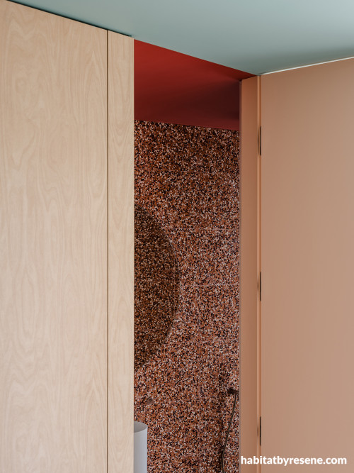 Bathroom and living area painted in Resene Juniper and Resene Red Oxide