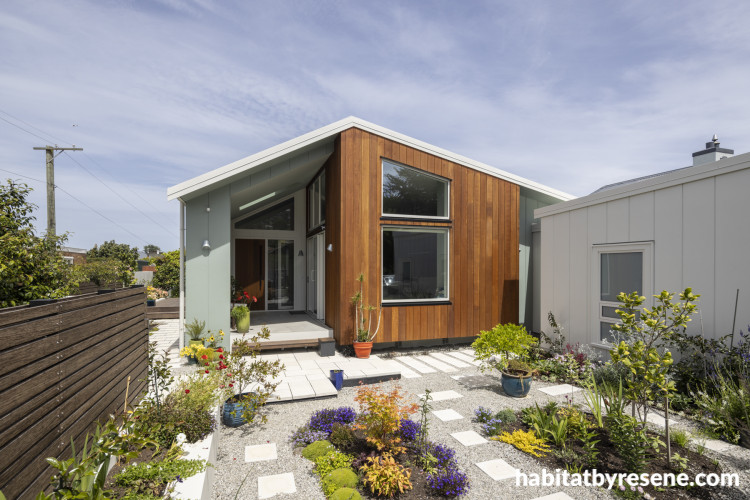 Exterior featuring timber elements and painted with Resene Blue Smoke and Resene Titania