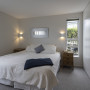 Bedroom painted in Resene Double Sea Fog and Resene Half Alabaster