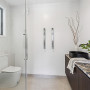 Modern white bathroom painted in Resene White Pointer