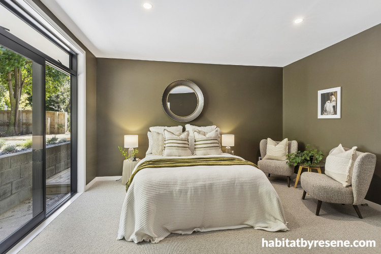 Bedroom featuring deep olive green Resene Woodrush