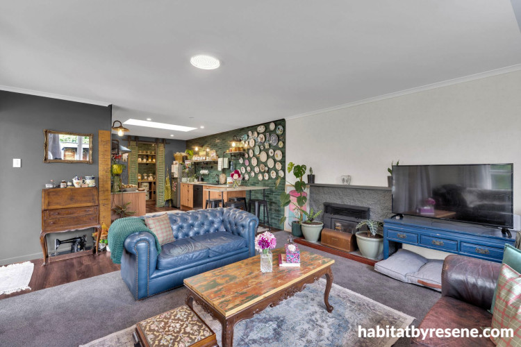 Living room with walls in Resene Armadillo and Pearl, ceiling in Black White
