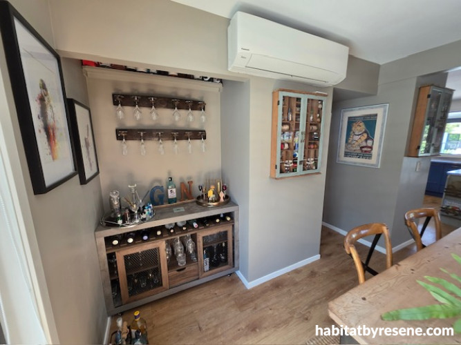 Bar and dining area featuring walls in Resene Half Pravda, trims in Black White