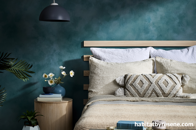 Teal bedroom featuring wall painted in Resene Undercover with Resene FX Paint Effects Medium mixed with Deep Teal and Nepal