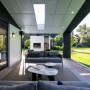 Outdoor living area, outdoor patio featuring black and white accents