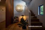 Entranceway, stairwell featuring timber floors and wood panelling