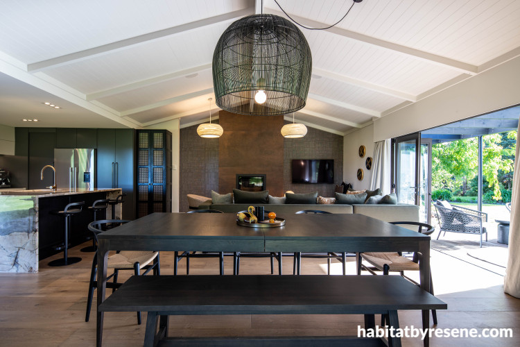 Living area, open plan dining area featuring wooden floors