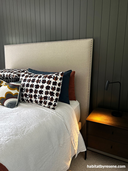 Bedroom, bedroom featuring panelled wall in Resene Tapa