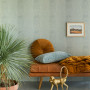 Living area, living area featuring snakeskin-look wallpaper