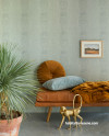 Living area, living area featuring snakeskin-look wallpaper