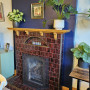 Fireplace, brick fireplace with dark blue wall, fireplace with wall in Resene Blue Night