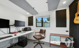 Home studio with walls painted in white