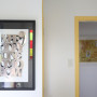 White doorway with yellow trims