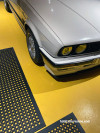 Garage featuring bold yellow floor