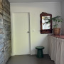 Laundry, laundry featuring a timber wall and a white wall