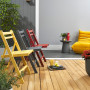 Outdoor patio featuring bright coloured chairs