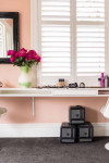 Makeup artist gives her villa a character makeover with bold pops of colour including blush pink