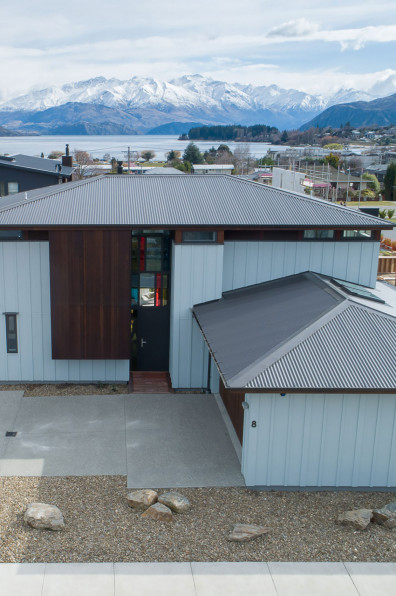 This icy shade of blue helps this new build blend into the Wanaka landscape This icy shade of blue helps this new build blend into the Wanaka landscape